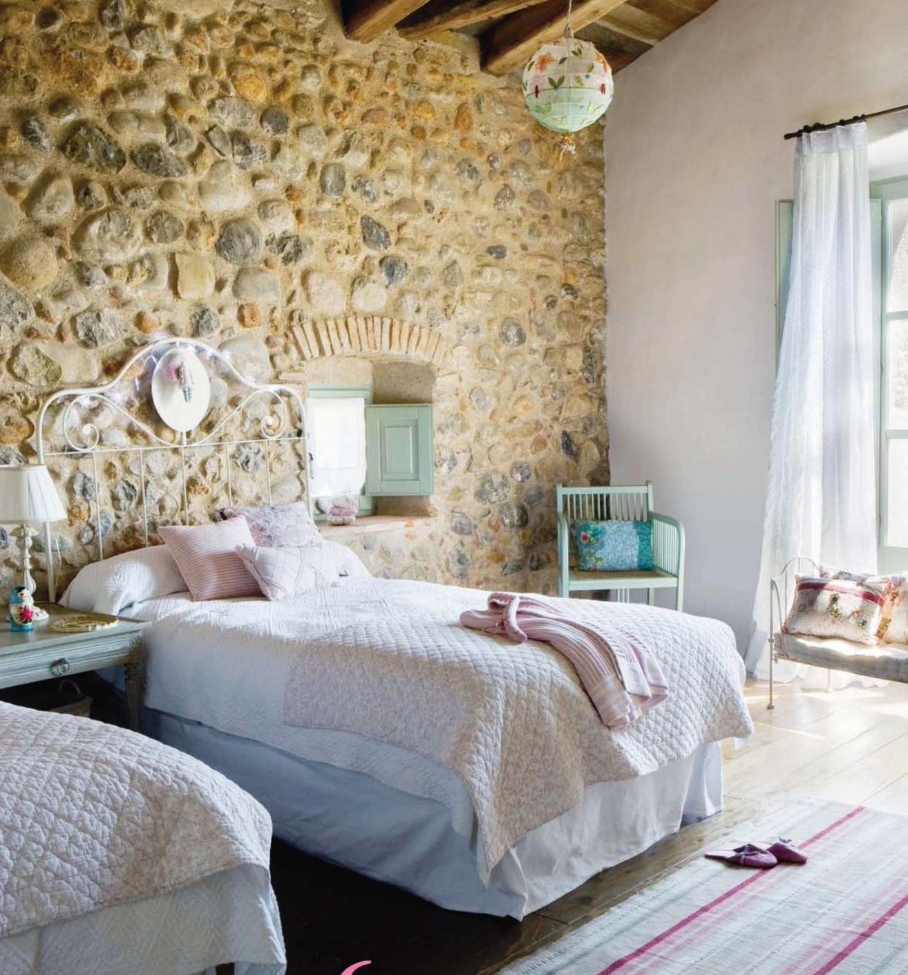 Exposed stone wall in offbeat places, like in this children’s room is a very creative and bold design decision