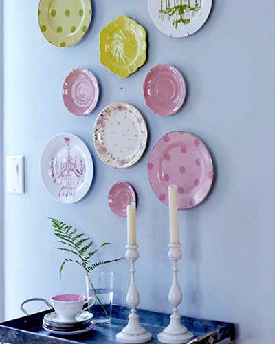 Use beautiful ceramic plates to create an artwork on the wall. Image source