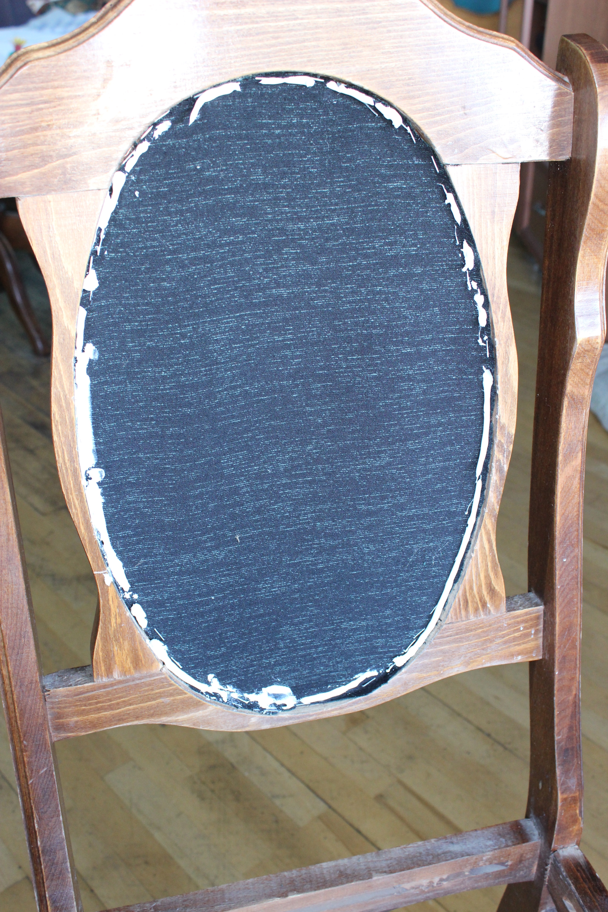 reupholstering a chair.