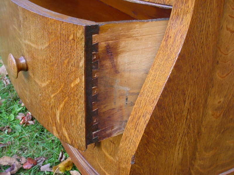 Dovetail joint in antique furniture. Image source