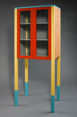 D'Antibes bookcase by George J. Sowden stands on four tall square legs. 